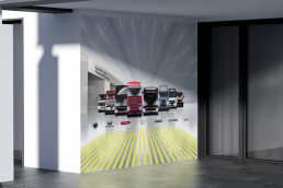Wanddruck mit dem Visual der Day One Grafik von Daimler Truck